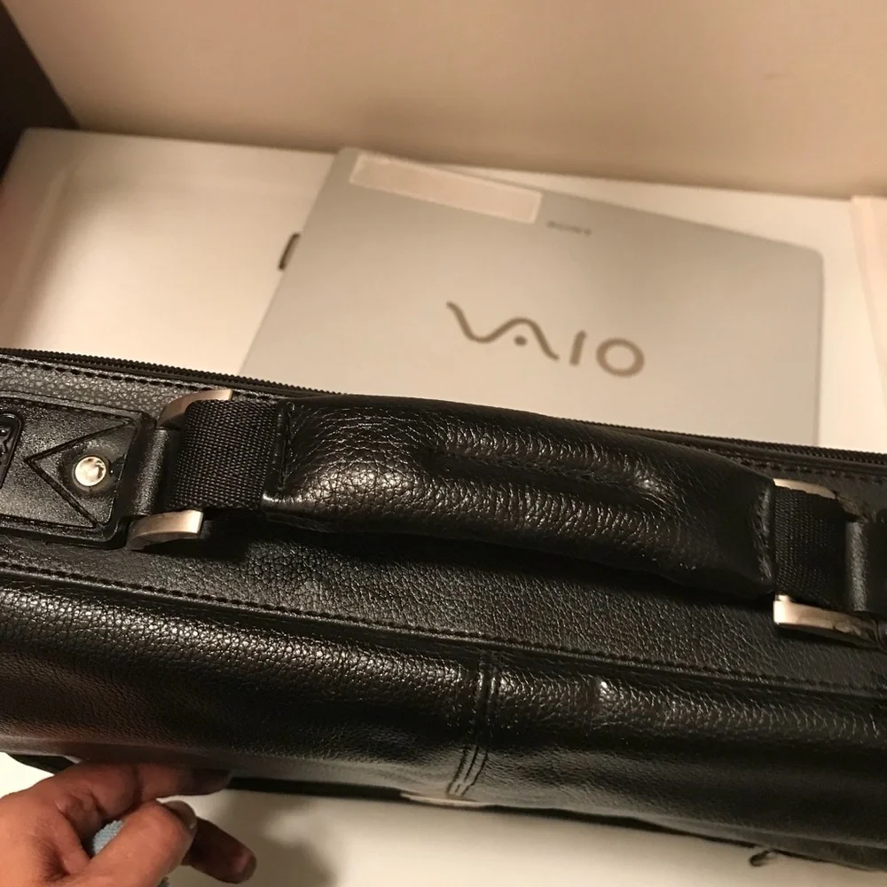 Dell laptop and office briefcase 💼